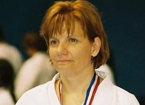 Female athlete in martial arts uniform