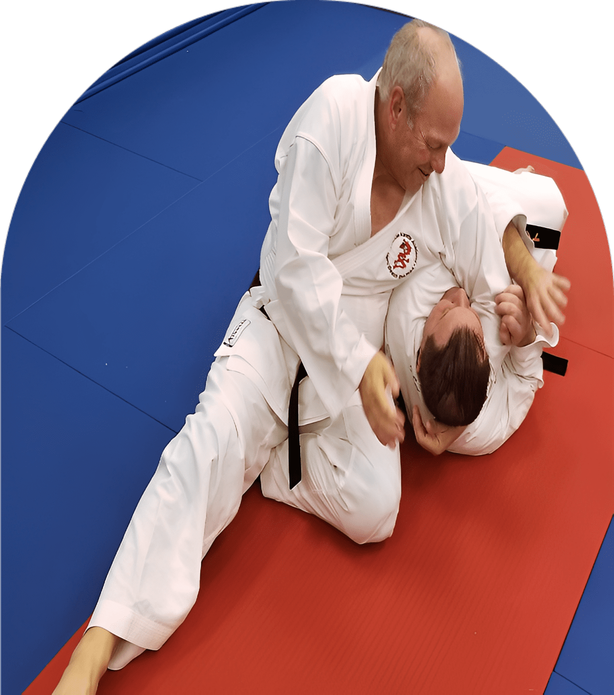 Two men practicing judo techniques