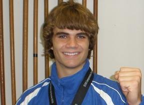 Happy person wearing a medal around neck