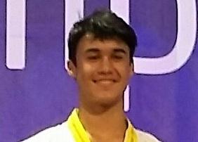 Smiling person with dark hair