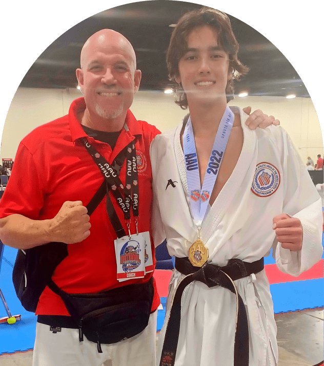 Karateka and coach at competition event