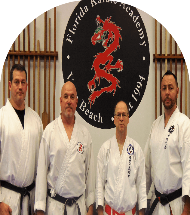 Group of karate teachers in uniforms