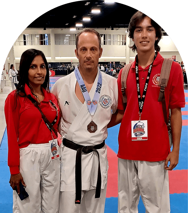 Group wearing karate uniforms indoors